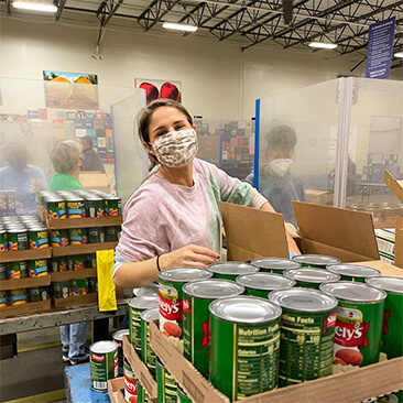 https://www.nescoresource.com/storage/cms/18755/nesco-food-bank-volunteer.jpg?msts=1703087774